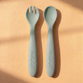 Mabel food-grade silicone spoon and fork in Pistachio Moody Blue for baby-led weaning