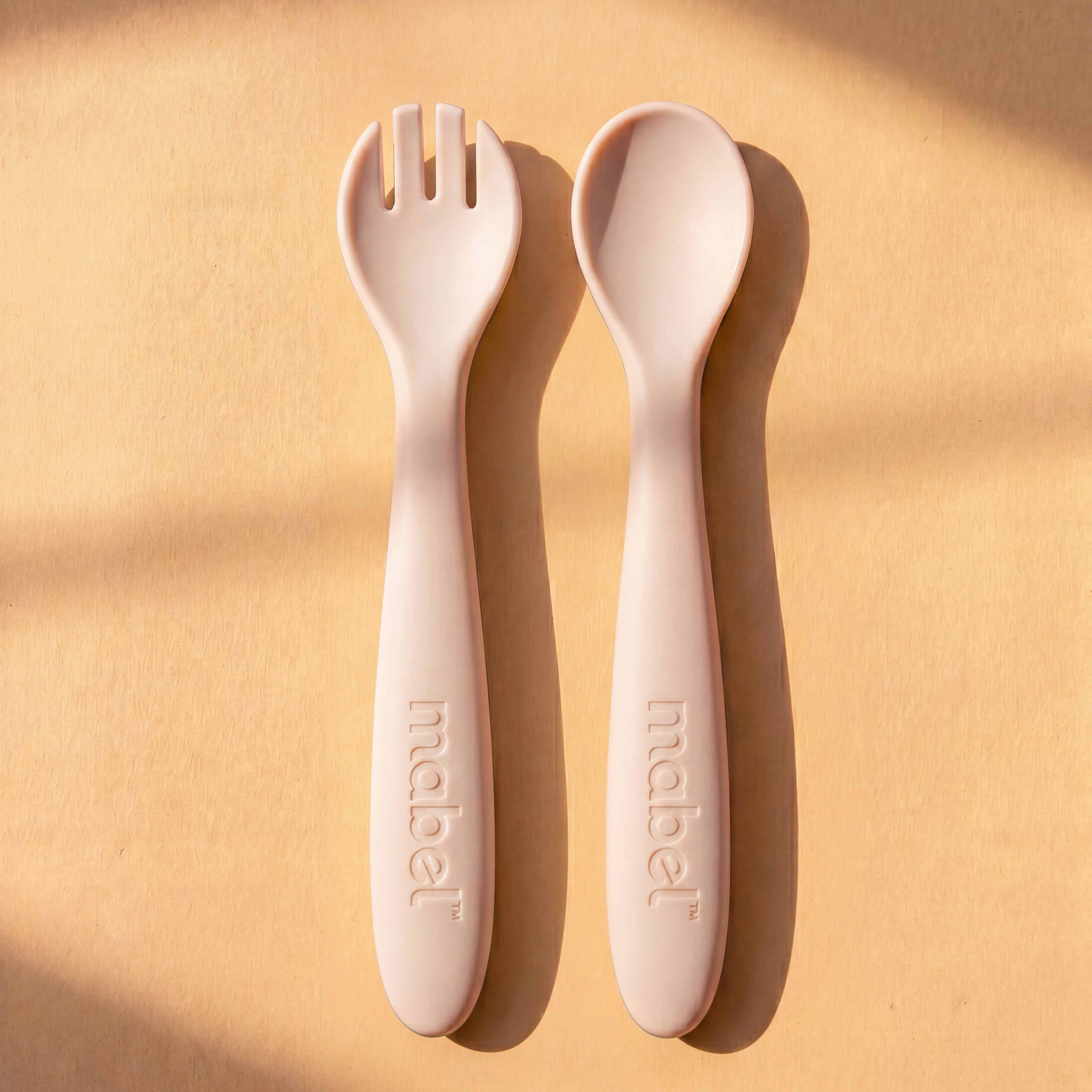 Mabel food-grade silicone spoon and fork in Milk White for baby-led weaning